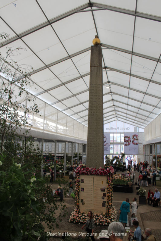 Obelisk monument in the centre of the Chelsea Flower Show Great Pavilion