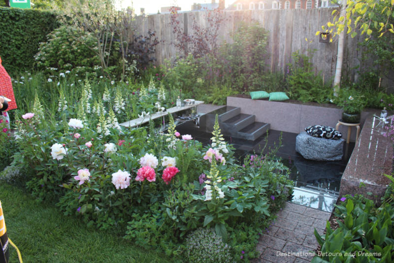 A sunken sitting space inside an urban garden - the Roots In Finland Kyrö Garden at the 2019 Chelsea Flower Show