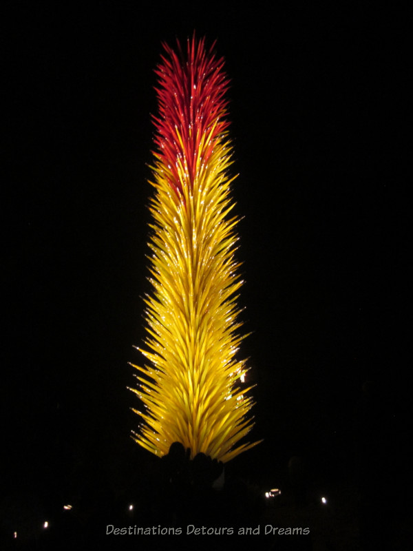 Chihuly icicle sculpture at night