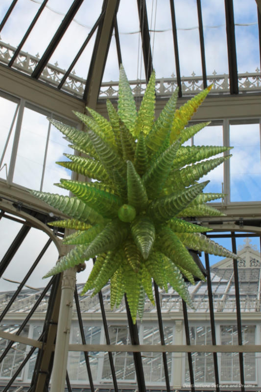 Hanging Chihuly sculpture shaped as a ball of chartreuse cones