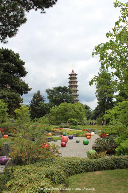 Chihuly Niijima Floats glass art at Kew Gardens with view of the Great Pagoda in the background