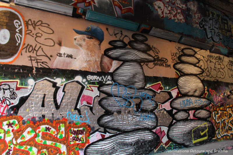 London Graffiti Tunnel: Wall of Graffiti Paintings on wall of London Leake Street Tunnel