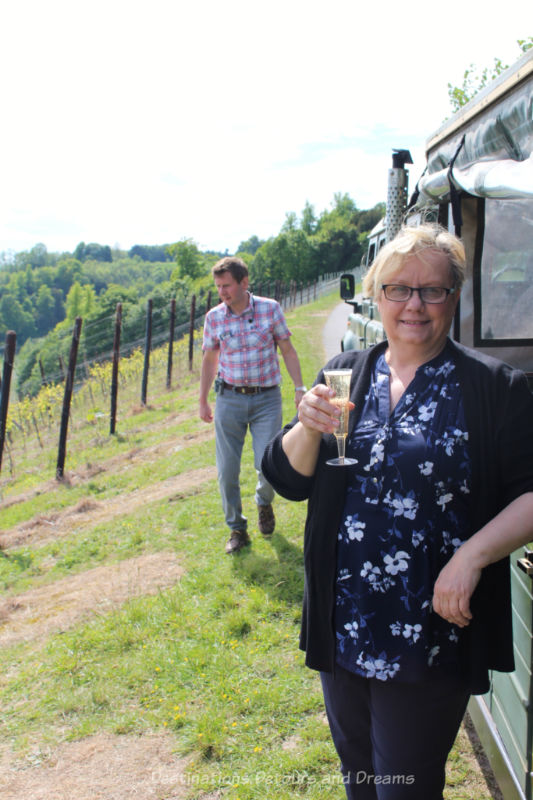 Blogger with a glass of bubbly on the Denbies Wine Estate Vineyard Tour