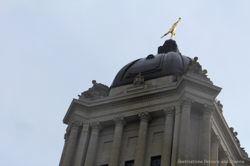 Gold Boy statue of Hermes atop the Manitoba Legislative Building
