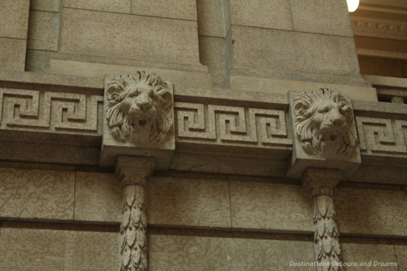 Stone lions on the wall of the Manitoba Legislative Building