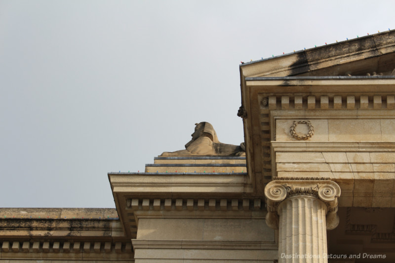 A carved sphinx atop the Tyndall stone Manitoba Legislative Building