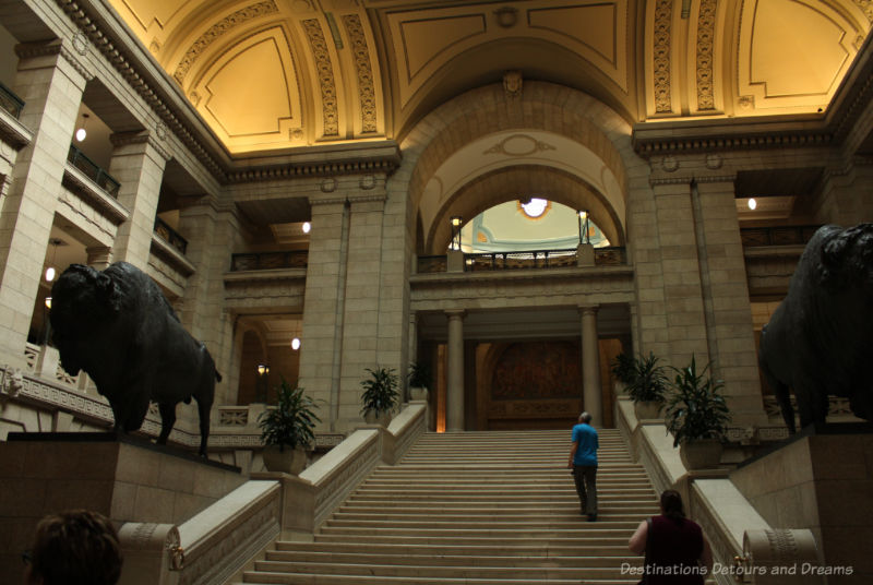 Bison on either side of the Tyndall stone Grand Staircase at the Manitoba Legislative Building