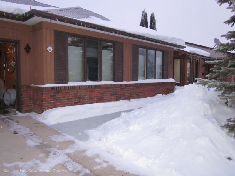 Homeward bound - snow in front of home with cleared sidewalk