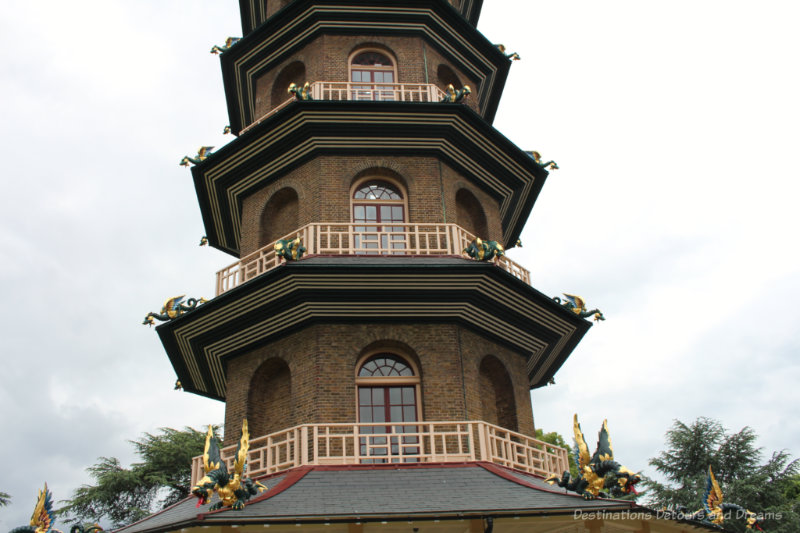 Part of the tower of the pagoda at Kew Gardens with dragons decorating it