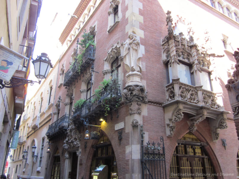 Ornate facade of Els Quatre Gats building in Barcelona