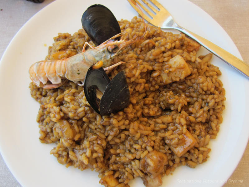 Plate of paella with shrimp and mussels