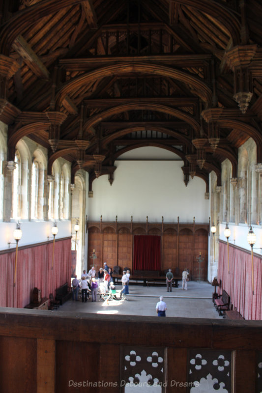 Medieval great hall with dark wood beamed ceiling at Eltham Palace