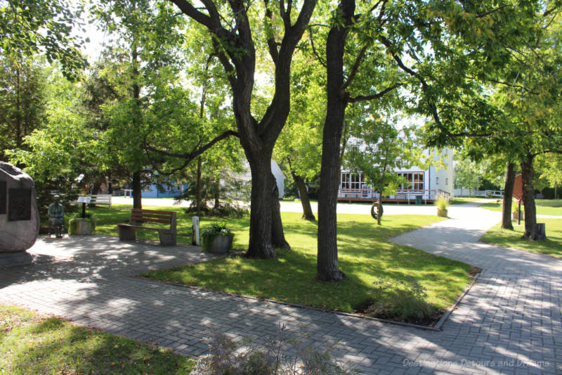 Shaded walkway to recreated late 19th century Mennonite village