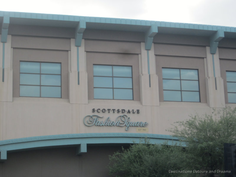 Scottsdale Trolley Fashion Square Gray building with turquoise trim of the Scottsdale Fashion Square