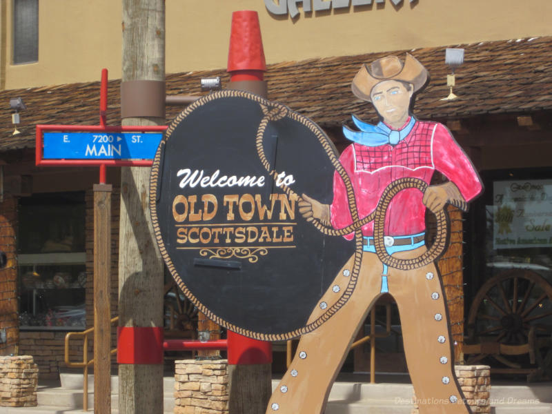 Sign of cowboy with lasso Welcome to Old Town Scottsdale sign