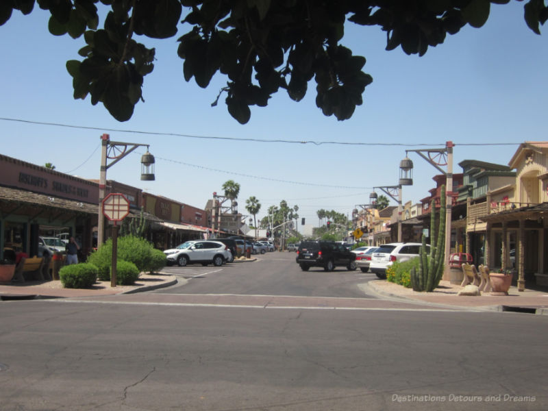 Wide street with rustic old-West style buildings on either side  in Old Town Scottsdale