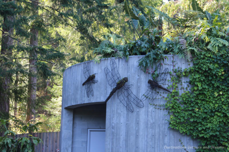Butchart Gardens Art Insects Art insects on wall in garden