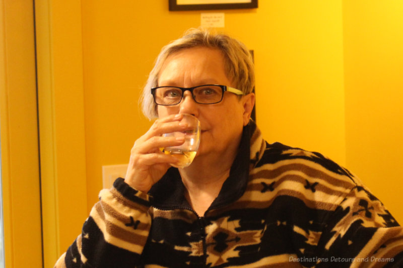 woman drinking a sample of cider