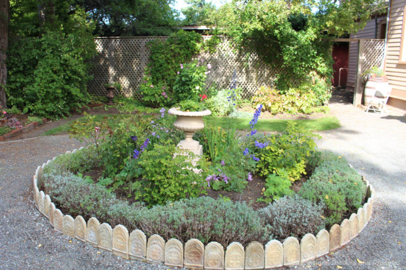 Circular garden edged with Gothic tiles