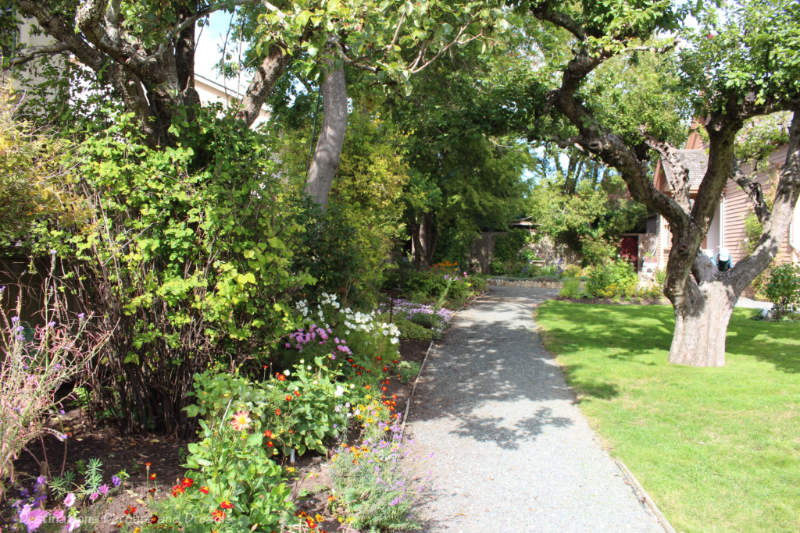 Flower bed and walkway to Ross Bay Villa