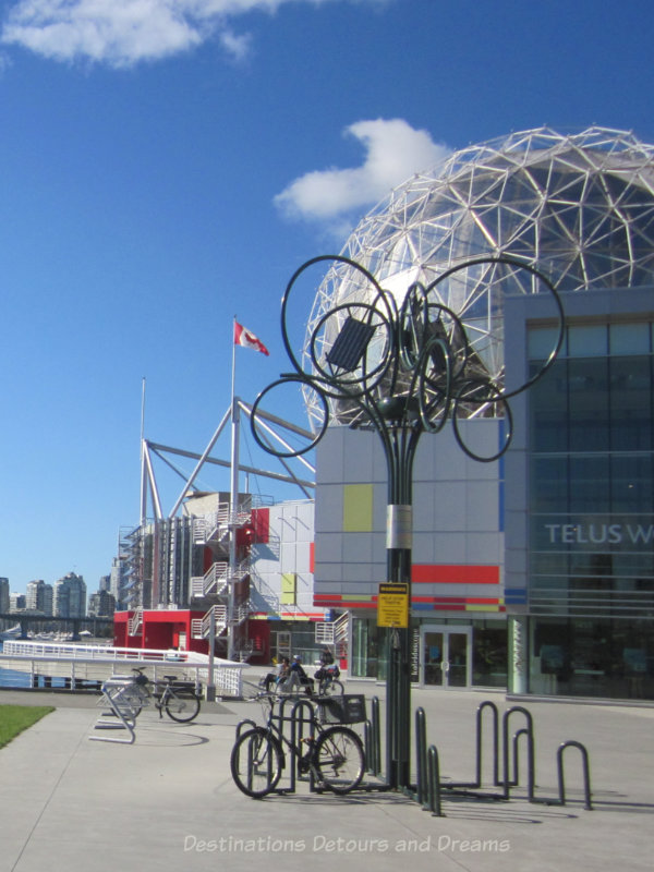 Metal tree-like sculpture that is also a bike rack at Vancouver Science Centre