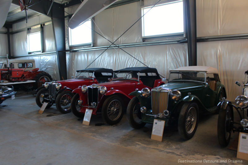 Vintage cars in a garage at The Roost