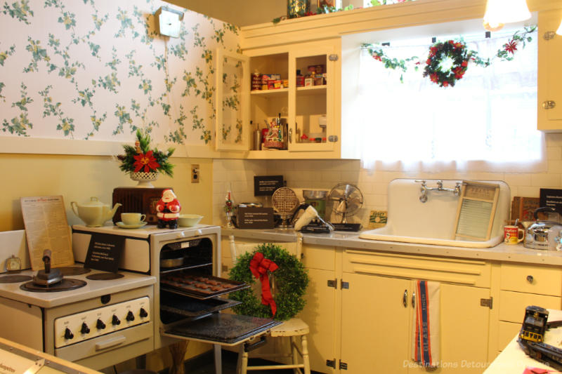 Recreated 1940s and 1950s era kitchen featuring electric range on display at Manitoba Electrical Museum