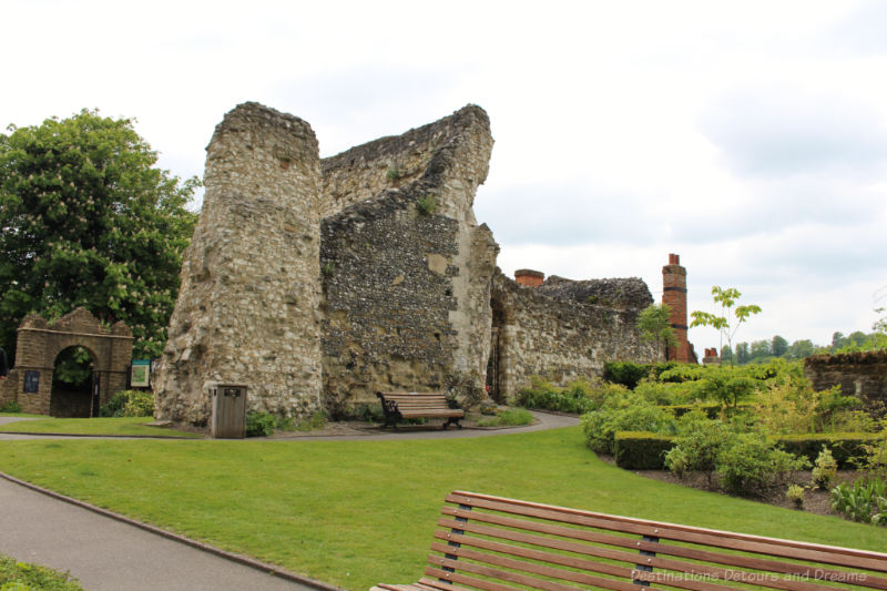 Ruins of Guildford Castle stone walls amid the park-like setting of the castle grounds