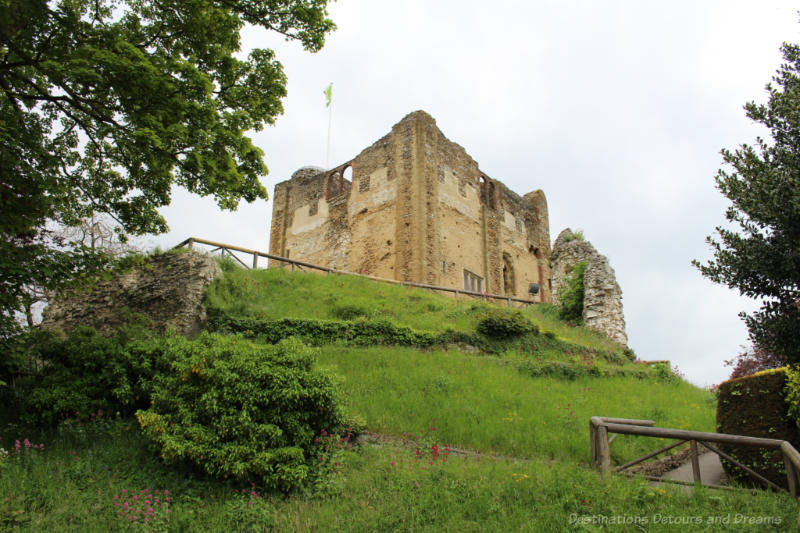 Guildford Castle stone Tower atop a grassy hill