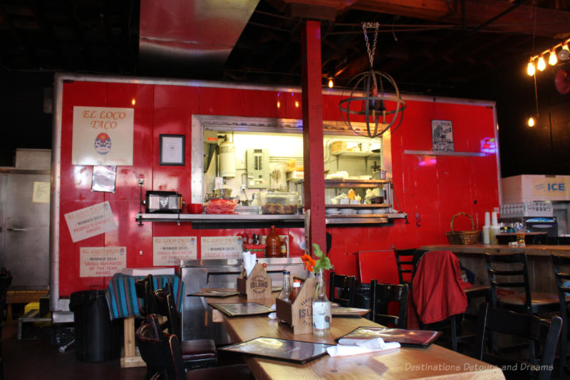 Red taco food truck now parked inside El Taco Restaurant on Salt Spring Island and serving as the restaurant's kitchen