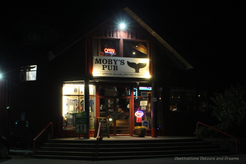 Entrance to Moby's Pub in the evening after dark