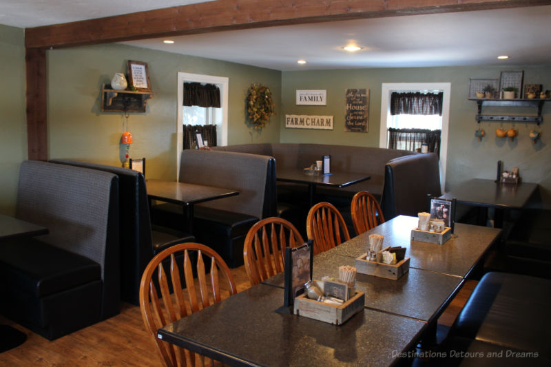 Country charm restaurant dining area with booths and tables