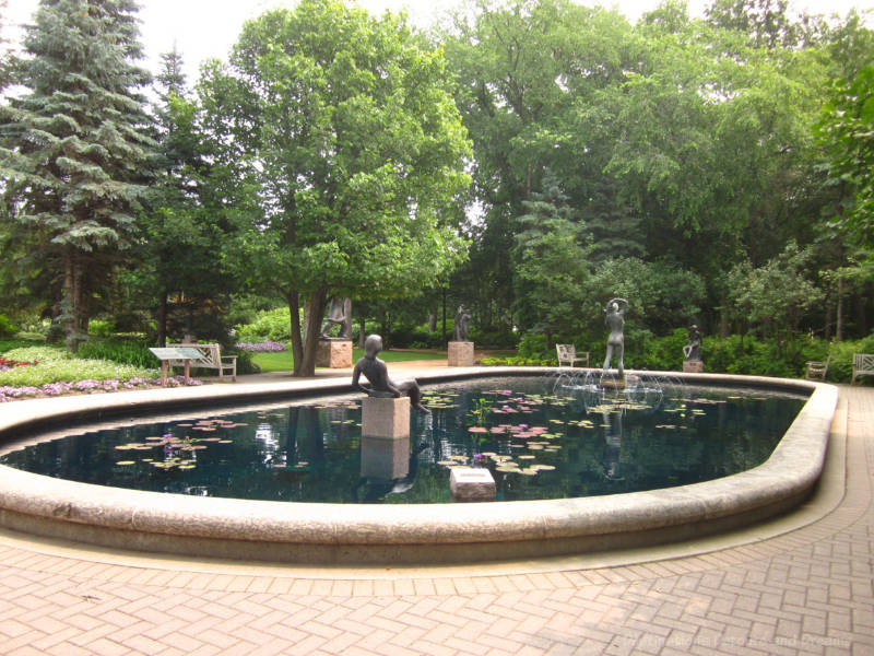 Sculpture in a fountain in a sculpture garden in a park
