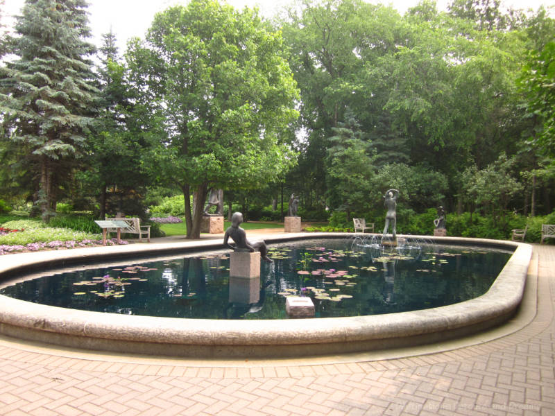 Tourist At Home: Park Sculpture Garden Sculpture in a fountain in a sculpture garden in a park