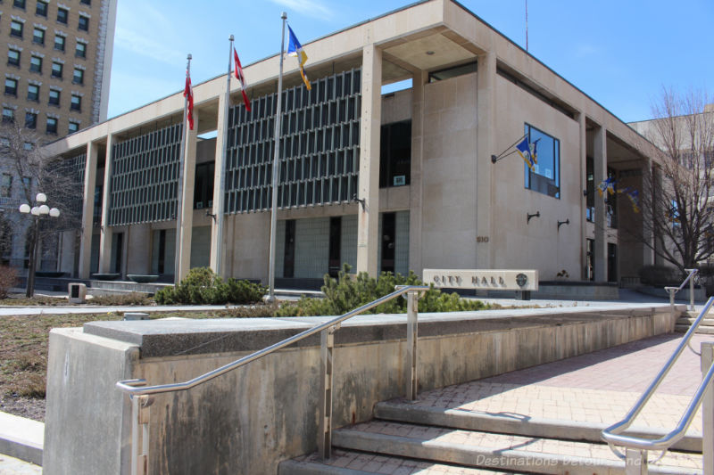 A two story concrete Modernist building