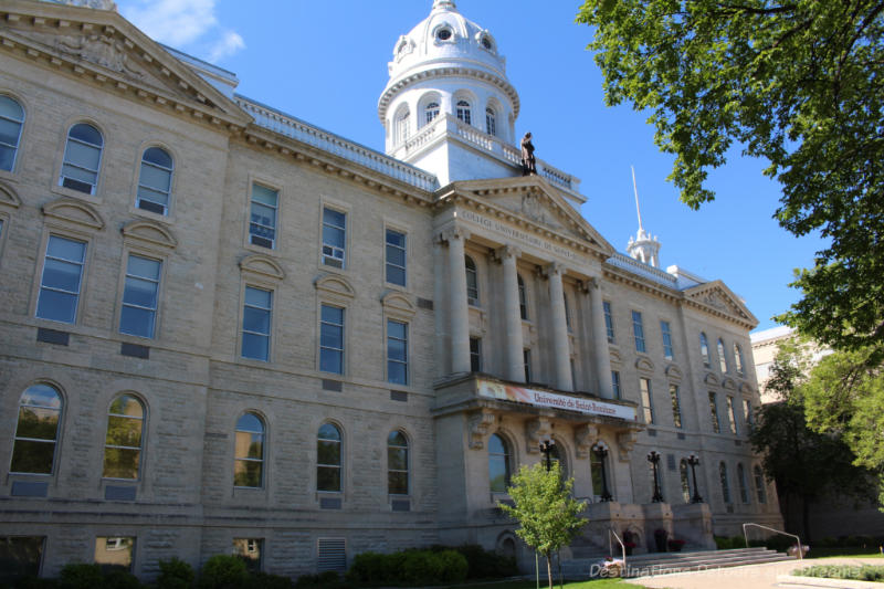 Stone university building with rotunda tower