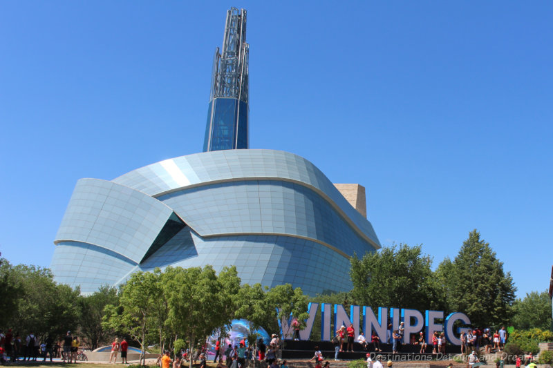 Winnipeg sign in front of the Museum for Human Rights Building