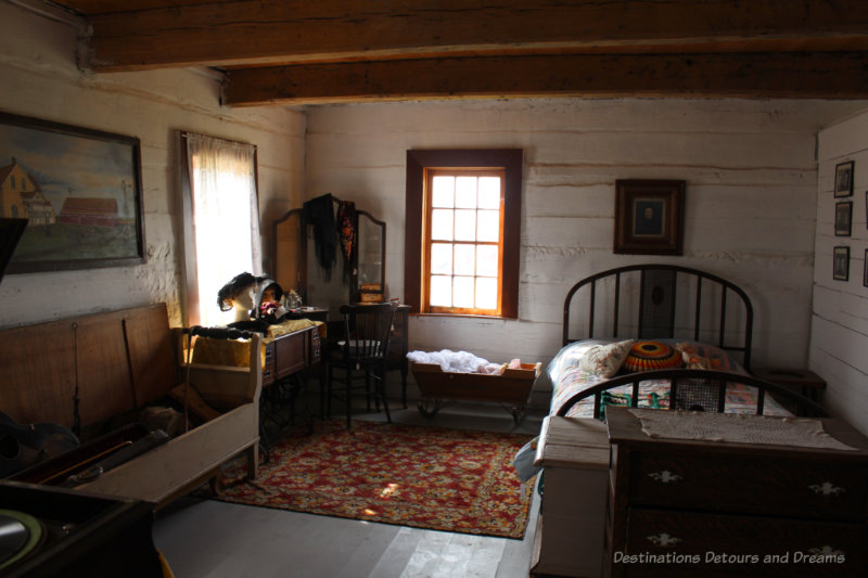 Bedroom inside a log home as per late 1800s