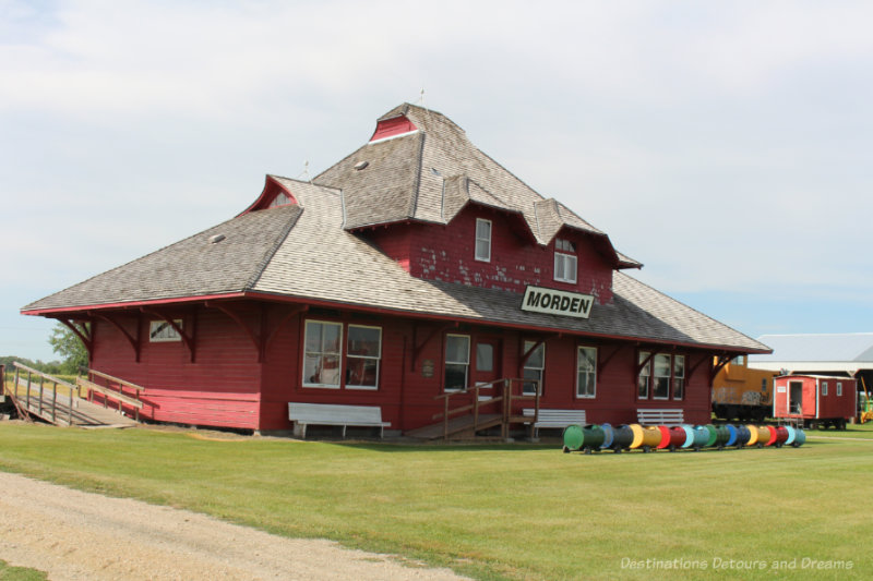 Red train station circa 1905