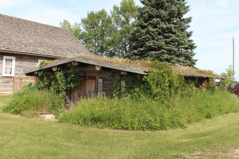 Sod house with foliage growing up the sides