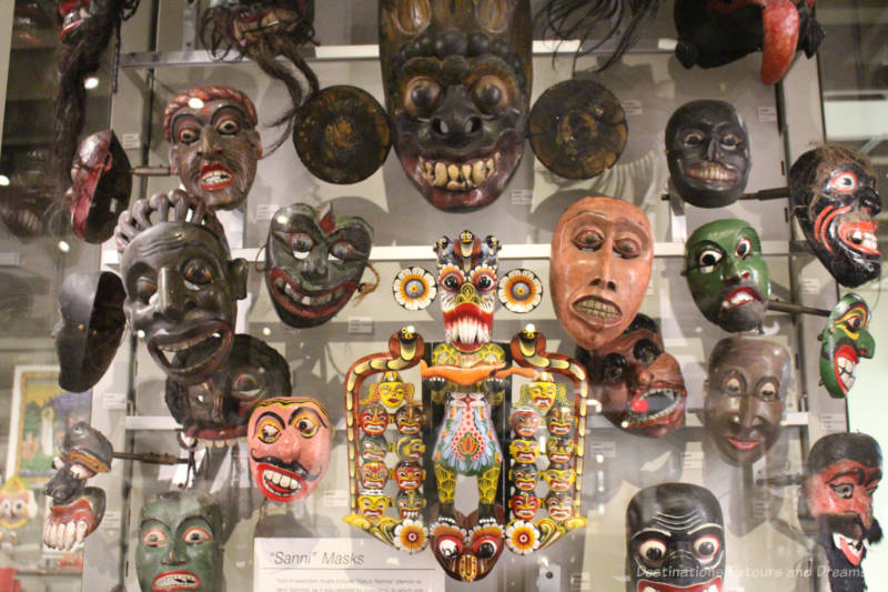 A collection if Sanni masks in a museum display at the Museum of Anthropology in Vancouver, British Columbia