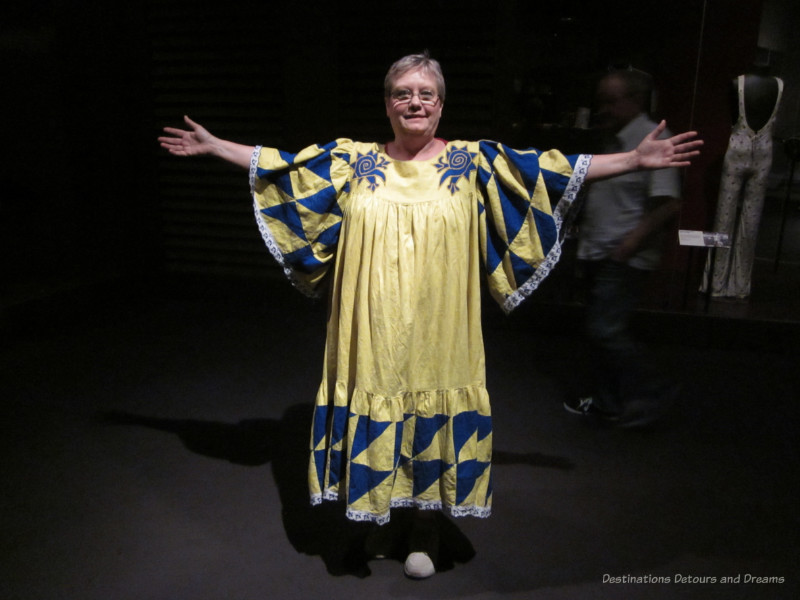 Theatre costume dress-up in gown of yellow and blue