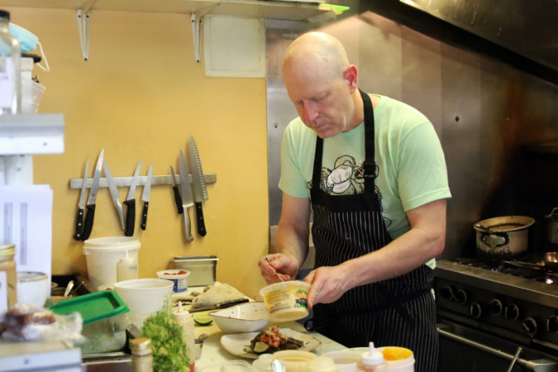 Chef Tim Payne cooking at Coho Restaurant on San Juan Island. Photo courtesy of Coho Restaurant and San Juan Islands Visitors Bureau