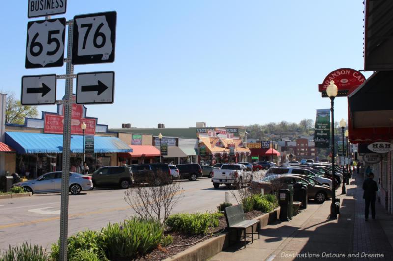 Street with angled parking and historic storefronts in downtown Branson, Missouri