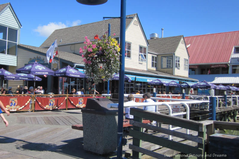 Restaurants with patios along the waterfront boardwalk in Steveston Village, British Columbia