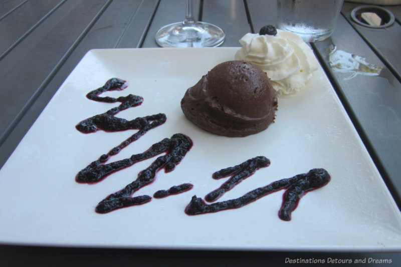 Square dessert play with chocolate mousse and drizzle