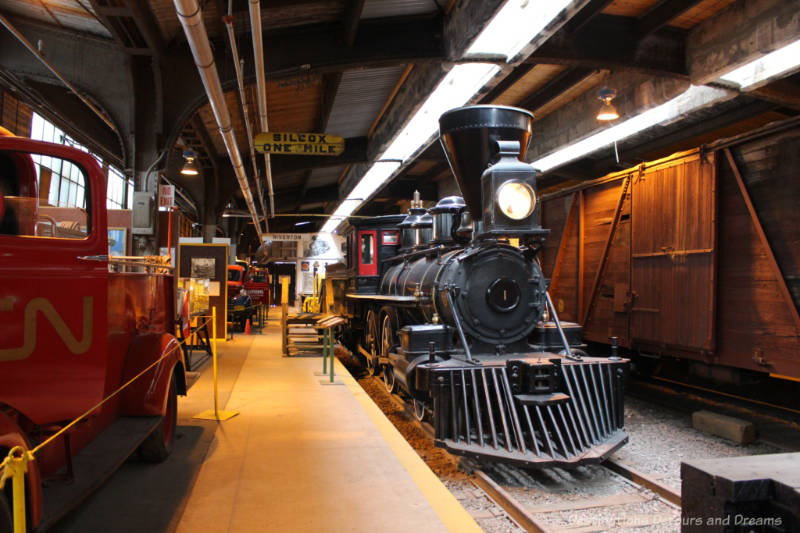 Steam locomotive on display along on a track at the Winnipeg Railway Museum