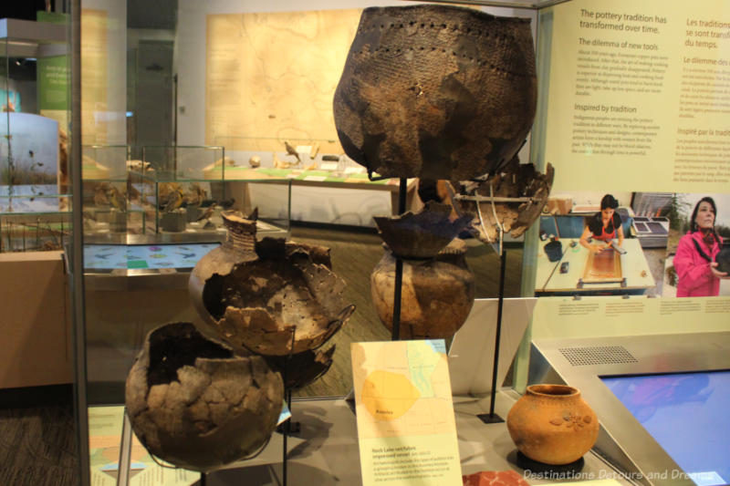 Display of historical Indigenous pottery at Manitoba Museum