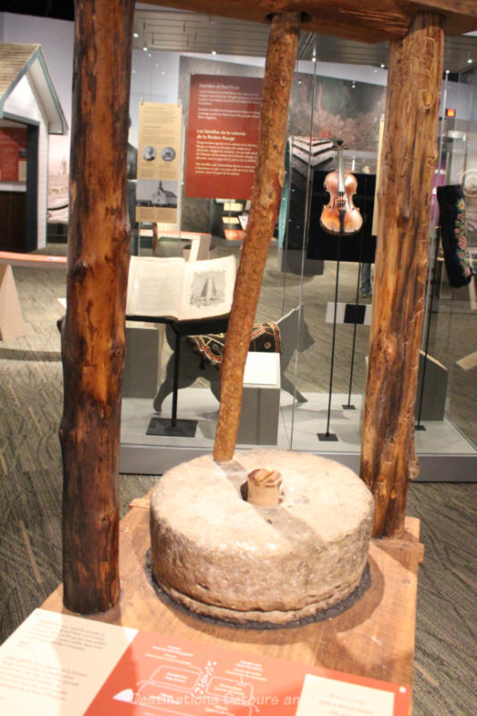 Stone quern for grinding wheat on display in museum
