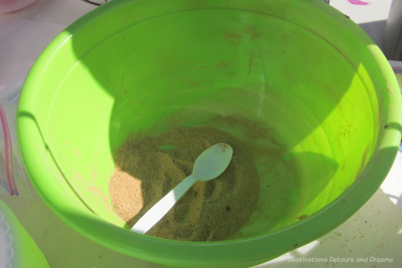 Mesquite Seeds Ground Ground mesquite seeds in a green bowl
